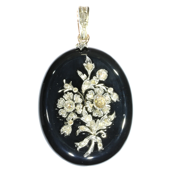 Antique Victorian onyx locket pendant with diamond loaded bouquet on top